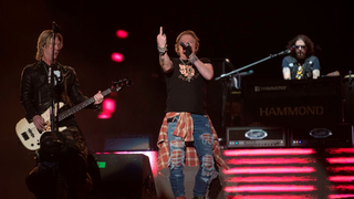 Welcome to the Jungle, Steve Mnuchin: Axl Rose Brings the Treasury Secretary to His Knees, Knees